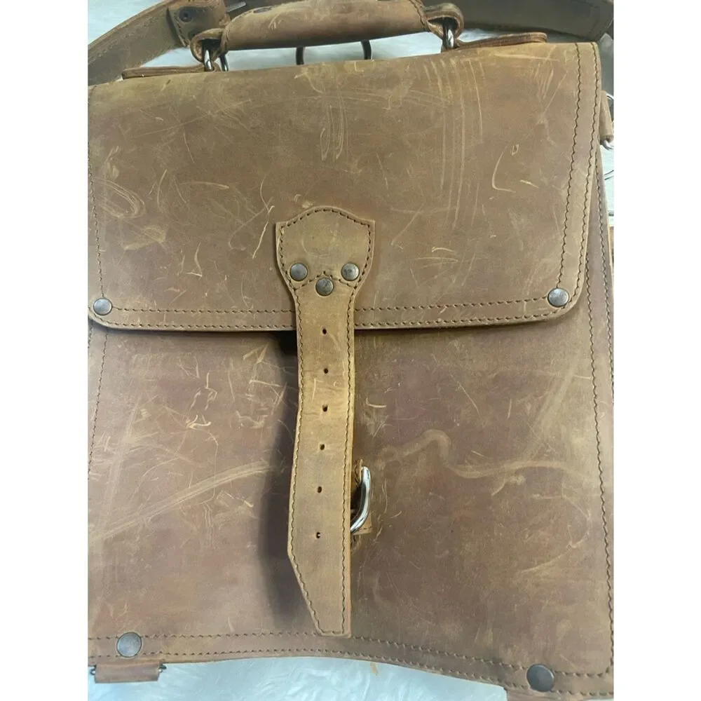 Saddleback Leather Brown convertible Messenger/backpack with. Removable divider